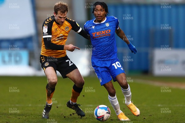 060321 - Colchester United v Newport County - Sky Bet League 2 - Jevani Brown of Colchester United and Mickey Demetriou of Newport County