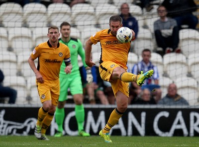 081016 - Colchester United vs Newport County  - SkyBet EFL League 2 -Jon Parkin of Newport clears his lines in style