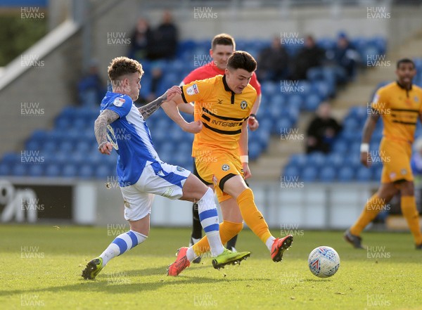 090319 - Colchester United v Newport County - Sky Bet League 2 -  Newports Regan Poole clears from Colchesters Sammie Szmodics