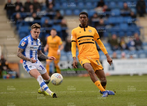 090319 - Colchester United v Newport County - Sky Bet League 2 -  Tyreeq Bakinson of Newport with Sammie Szmodics of Colchester