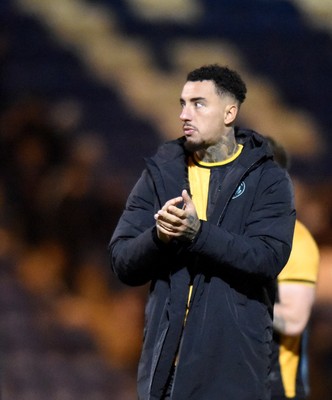 201225 - Colchester United v Newport County - Sky Bet League 2 - Courtney Baker-Richardson of Newport County applauds fans at the final whistle