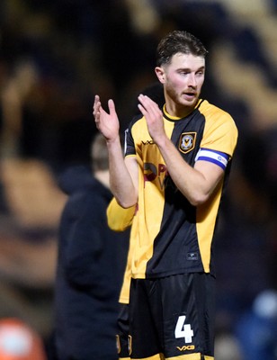 201225 - Colchester United v Newport County - Sky Bet League 2 - Matthew Baker of Newport County applauds fans after the final whistle 