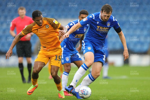 261019 - Colchester United v Newport County - Sky Bet League 2 -  Tom Eastman of Colchester United shields the ball from Tristan Abrahams of Newport County