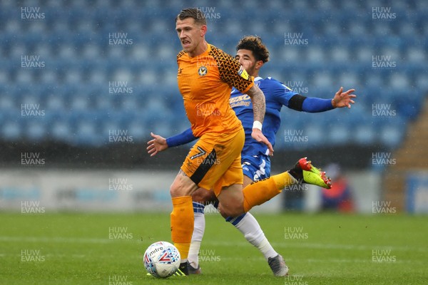 261019 - Colchester United v Newport County - Sky Bet League 2 -  Scot Bennett of Newport County and Courtney Senior of Colchester United