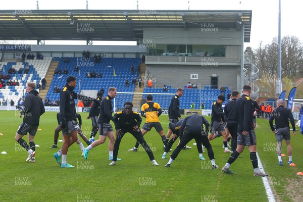 290324 - Colchester United v Newport County - Sky Bet League 2 - Newport county players warm up before match against Colchester Utd