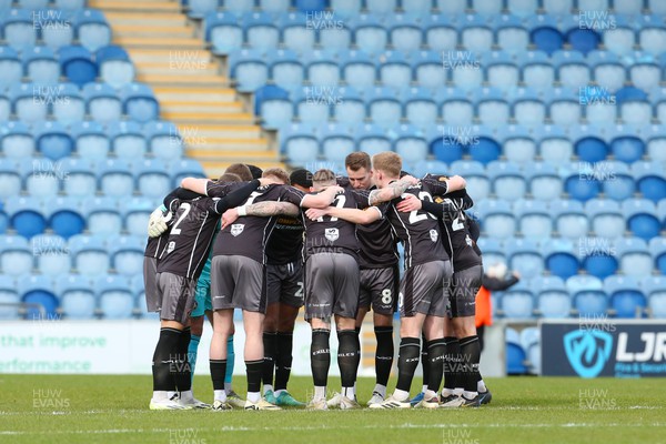 290324 - Colchester United v Newport County - Sky Bet League 2 - Newport players have a team talk prior kick off