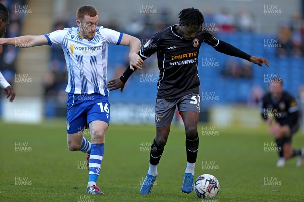 290324 - Colchester United v Newport County - Sky Bet League 2 - Matty Bondswell of Newport County dribbles the ball