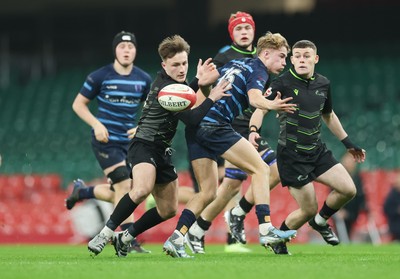 101225 - Coleg Cymoedd v Ysgol Gyfun Gymraeg Glantaf, Welsh Schools and Colleges Boys U18 Final - Ben Coomer of Coleg y Cymoedd and Finn Evans of Ysgol Gymraeg Glantaf compete for the ball