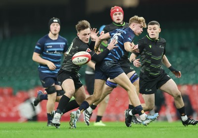 101225 - Coleg Cymoedd v Ysgol Gyfun Gymraeg Glantaf, Welsh Schools and Colleges Boys U18 Final - Ben Coomer of Coleg y Cymoedd and Finn Evans of Ysgol Gymraeg Glantaf compete for the ball