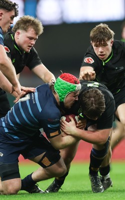 101225 - Coleg Cymoedd v Ysgol Gyfun Gymraeg Glantaf, Welsh Schools and Colleges Boys U18 Final - Alfie Prygodzicz of Ysgol Gymraeg Glantaf and Evan Hughes of Coleg y Cymoedd compete for the ball