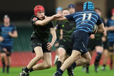 101225 - Coleg Cymoedd v Ysgol Gyfun Gymraeg Glantaf, Welsh Schools and Colleges Boys U18 Final - Harry Kinsey of Ysgol Gymraeg Glantaf holds off Devon Shorney of Coleg y Cymoedd