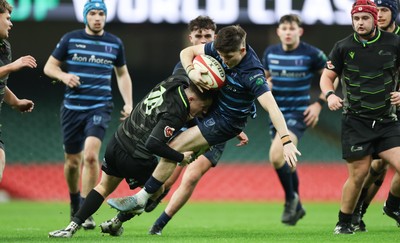 101225 - Coleg Cymoedd v Ysgol Gyfun Gymraeg Glantaf, Welsh Schools and Colleges Boys U18 Final - Evan Jones of Ysgol Gymraeg Glantaf is tackled by Ben Coomer of Coleg y Cymoedd