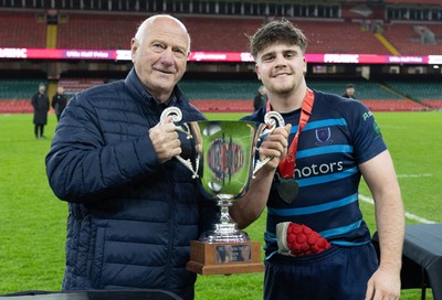 101225 - Coleg Cymoedd v Ysgol Gyfun Gymraeg Glantaf, Welsh Schools and Colleges Boys U18 Final -  WRU President Terry Cobner presents Alfie Prygodzicz Captain of Ysgol Gymraeg Glantaf with the trophy
