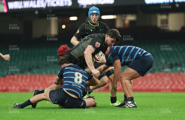 101225 - Coleg Cymoedd v Ysgol Gyfun Gymraeg Glantaf, Welsh Schools and Colleges Boys U18 Final - Ioan Dacey of Coleg y Cymoedd is tackled by Efan Jenkins of Ysgol Gymraeg Glantaf