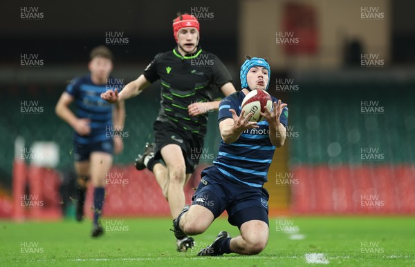 101225 - Coleg Cymoedd v Ysgol Gyfun Gymraeg Glantaf, Welsh Schools and Colleges Boys U18 Final - Harry Kinsey of Ysgol Gymraeg Glantaf takes the ball as Devon Shorney of Coleg y Cymoedd closes in