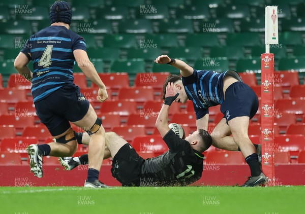 101225 - Coleg Cymoedd v Ysgol Gyfun Gymraeg Glantaf, Welsh Schools and Colleges Boys U18 Final - Jack Piotecki of Coleg y Cymoedd is forced into touch just short of the line
