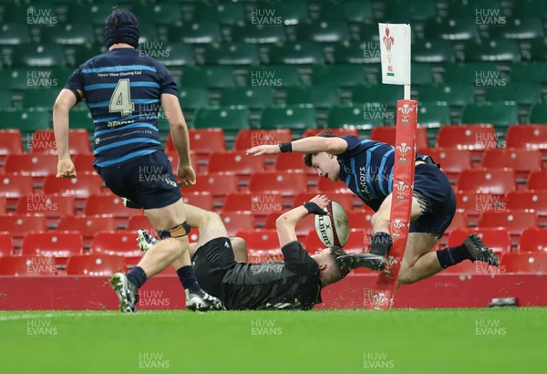 101225 - Coleg Cymoedd v Ysgol Gyfun Gymraeg Glantaf, Welsh Schools and Colleges Boys U18 Final - Jack Piotecki of Coleg y Cymoedd is forced into touch just short of the line