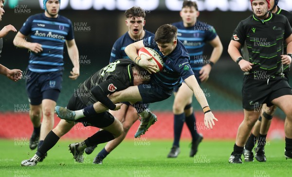 101225 - Coleg Cymoedd v Ysgol Gyfun Gymraeg Glantaf, Welsh Schools and Colleges Boys U18 Final - Evan Jones of Ysgol Gymraeg Glantaf is tackled by Ben Coomer of Coleg y Cymoedd