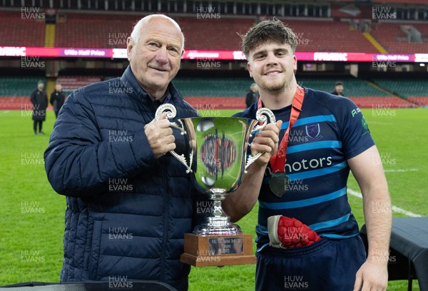 101225 - Coleg Cymoedd v Ysgol Gyfun Gymraeg Glantaf, Welsh Schools and Colleges Boys U18 Final -  WRU President Terry Cobner presents Alfie Prygodzicz Captain of Ysgol Gymraeg Glantaf with the trophy