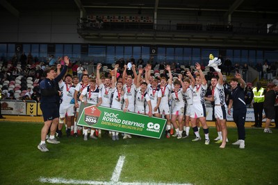270426 - Coleg Gwent v Cardiff and Vale College - WSC Boys U18 Development Final -  Road To Principality Finals - Cardiff players celebrate lifting the trophy at full time