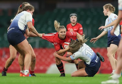 101225 - Coleg Gwent v Llandovery College Welsh Schools and Colleges Girls U18 Final - Catrin Williams of Coleg Gwent is tackled