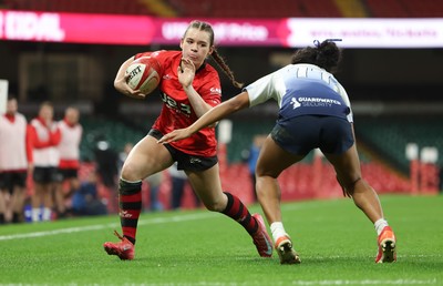101225 - Coleg Gwent v Llandovery College Welsh Schools and Colleges Girls U18 Final - Ruby Cole of Coleg Gwent is tackled just short of the line by Zillah Radrodro of Llandovery College