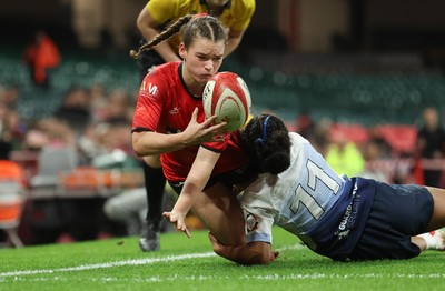 101225 - Coleg Gwent v Llandovery College Welsh Schools and Colleges Girls U18 Final - Ruby Cole of Coleg Gwent is tackled just short of the line by Zillah Radrodro of Llandovery College