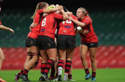 101225 - Coleg Gwent v Llandovery College Welsh Schools and Colleges Girls U18 Final - Sienna McCormack of Coleg Gwent celebrates with team mates after scoring try