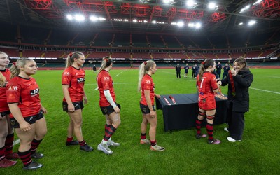101225 - Coleg Gwent v Llandovery College Welsh Schools and Colleges Girls U18 Final - Wales International Kerin Lake presents the winners medals to Coleg Gwent