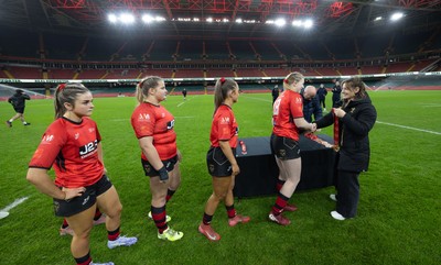 101225 - Coleg Gwent v Llandovery College Welsh Schools and Colleges Girls U18 Final - Wales International Kerin Lake presents the winners medals to Coleg Gwent