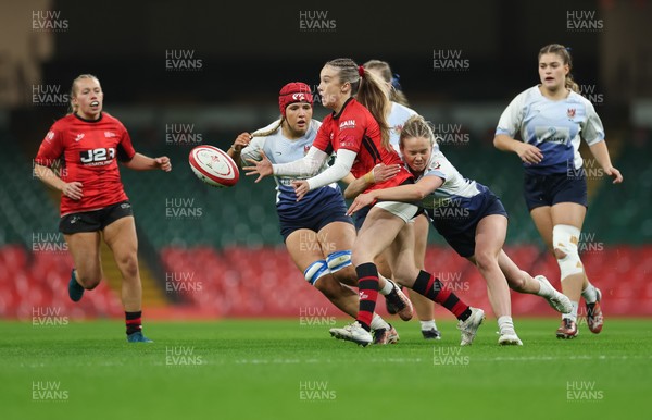 101225 - Coleg Gwent v Llandovery College Welsh Schools and Colleges Girls U18 Final - Megan Thomas of Coleg Gwent feeds the ball out