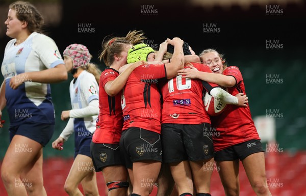 101225 - Coleg Gwent v Llandovery College Welsh Schools and Colleges Girls U18 Final - Sienna McCormack of Coleg Gwent celebrates with team mates after scoring try
