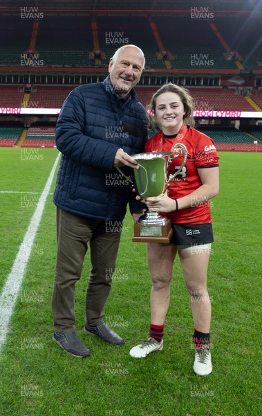 101225 - Coleg Gwent v Llandovery College Welsh Schools and Colleges Girls U18 Final - WRU President Terry Cobner presents the trophy to Coleg Gwent captain Lily Hawkins