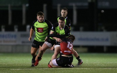 140120 - Coleg y Cymoedd v Coleg Gwent, WRU National Schools and Colleges League Final - Ryan Wilkins of Coleg y Cymoedd is tackled by Morgan Lloyd of Coleg Gwent