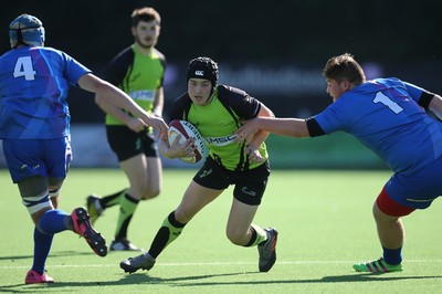 051016 - Coleg y Cymoedd v Gower College, WRU Wednesday U18 League - Cavan Slade of Coleg y Cymoedd gets between Rhys Laugaharne of Gower College and Rhys Thomas of Gower College