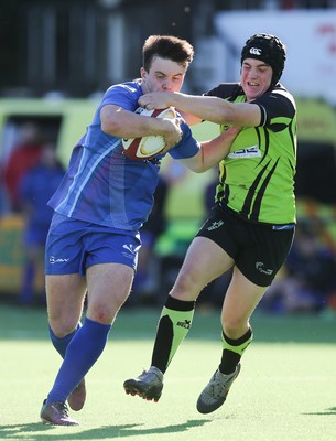 051016 - Coleg y Cymoedd v Gower College, WRU Wednesday U18 League - Callum Carson of Gower College holds off Cavan Slade of Coleg y Cymoedd