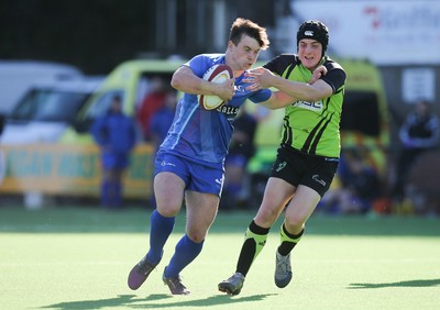 051016 - Coleg y Cymoedd v Gower College, WRU Wednesday U18 League - Callum Carson of Gower College holds off Cavan Slade of Coleg y Cymoedd