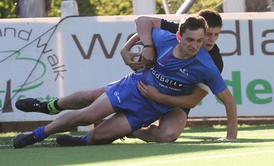 051016 - Coleg y Cymoedd v Gower College, WRU Wednesday U18 League - Jake Tucker of Gower College is tackled by Eddie Francis of Coleg y Cymoedd