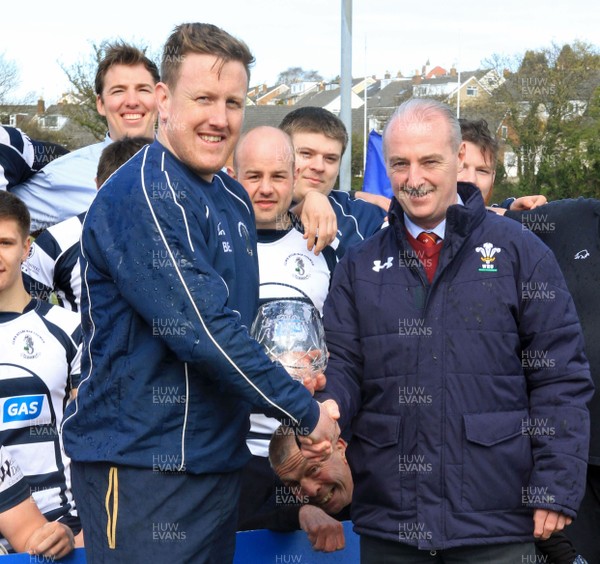 230416 - Colwyn Bay v Llanidloes, SWALEC League 2 NorthWRU's Alwyn Jones presents Colwyn Bay captain Ben Evans with the  trophy