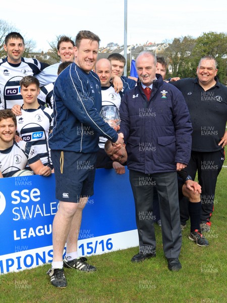 230416 - Colwyn Bay v Llanidloes, SWALEC League 2 NorthWRU's Alwyn Jones presents Colwyn Bay captain Ben Evans with the  trophy