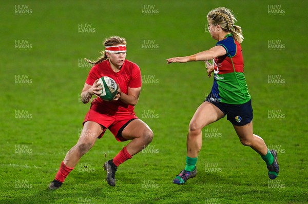 180223 - Combined Provinces XV v Welsh Development XV - Celtic Challenge - Niamh Terry of Wales Development XV in action against Ailsa Hughes of Combined Provinces XV