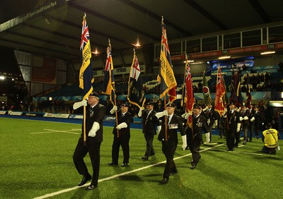 071114 - Combined Services Ladies v Cardiff Blues Ladies - Remembrance Rugby for The British Legion -Flags of the armed forces parade before kick off (c) Huw Evans Agency