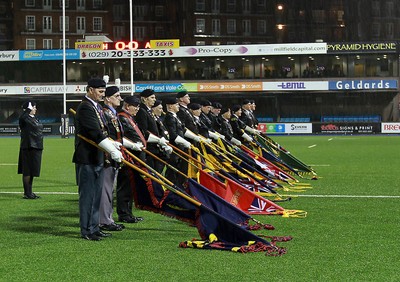 071114 - Combined Services Ladies v Cardiff Blues Ladies - Remembrance Rugby for The British Legion -Flags of the armed forces are lowered during the last post (c) Huw Evans Agency