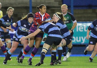 071114 - Combined Services Ladies v Cardiff Blues Ladies - Remembrance Rugby for The British Legion -Chantelle Miller of Combined Forces Ladies is tackled by Rachel Taylor and Jenny Hawkins of Cardiff Blues Ladies(c) Huw Evans Agency