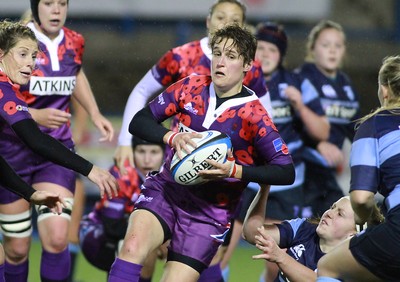 071114 - Combined Services Ladies v Cardiff Blues Ladies - Remembrance Rugby for The British Legion -Gemma Stonebridge-Smith of Combined Forces Ladies is tackled by Jenny Hawkins of Cardiff Blues Ladies(c) Huw Evans Agency