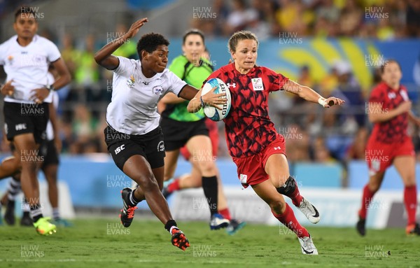 130418 - Rugby Sevens - Commonwealth Games - Jasmine Joyce of Wales runs in to score try