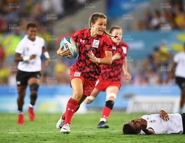 130418 - Rugby Sevens - Commonwealth Games - Jasmine Joyce of Wales runs in to score try