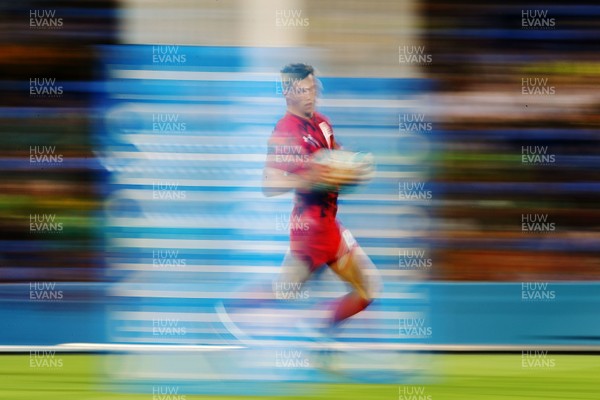 140418 - Rugby Sevens - Commonwealth Games - Morgan Williams of Wales runs in a try 