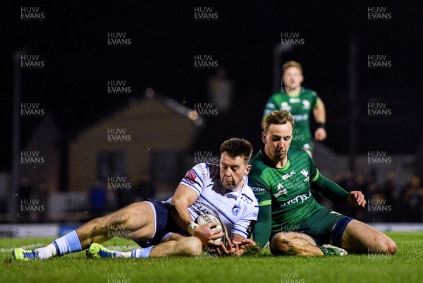 150220 - Connacht v Cardiff Blues - Guinness PRO14 -  Jason Harries of Cardiff Blues is tackled by John Porch of Connacht