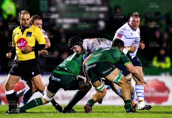 150220 - Connacht v Cardiff Blues - Guinness PRO14 -  James Ratti of Cardiff Blues is tackled by Eoin McKeon (left)